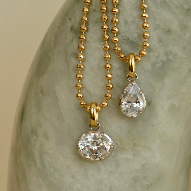 east west bezel oval cz diamond pendant two tone