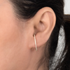 suspender gold earring minimal cz pave