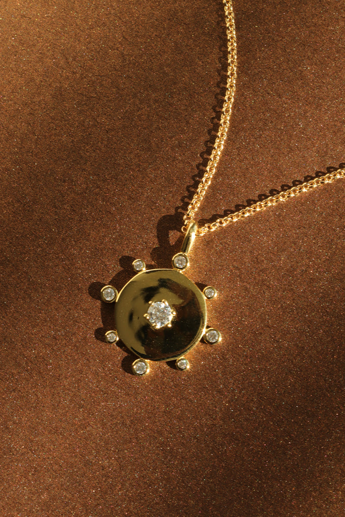 compass gold coin necklace