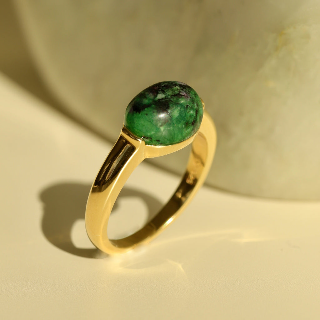 red green treasure stone emerald ring