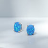 blue oval opal earrings studs