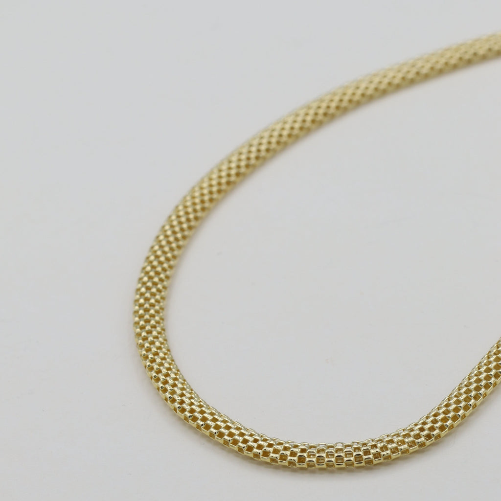 Celeste Gold Necklace by Ixora Jewelers